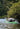 Person kayaking in the Swell Craft Scupper 16 on a calm river